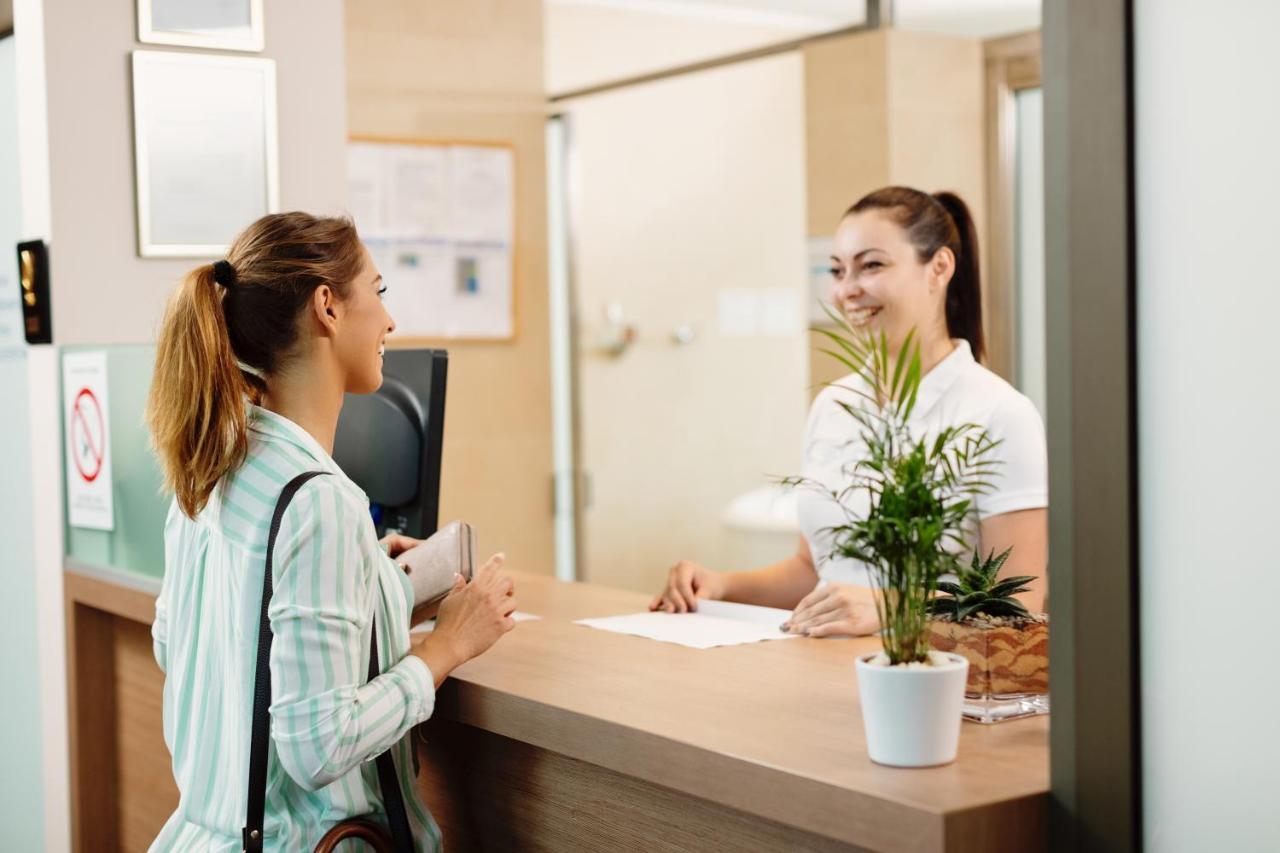 Hotel Premier Aqua - Adults Only Vrdnik Exterior photo Receptionist at work