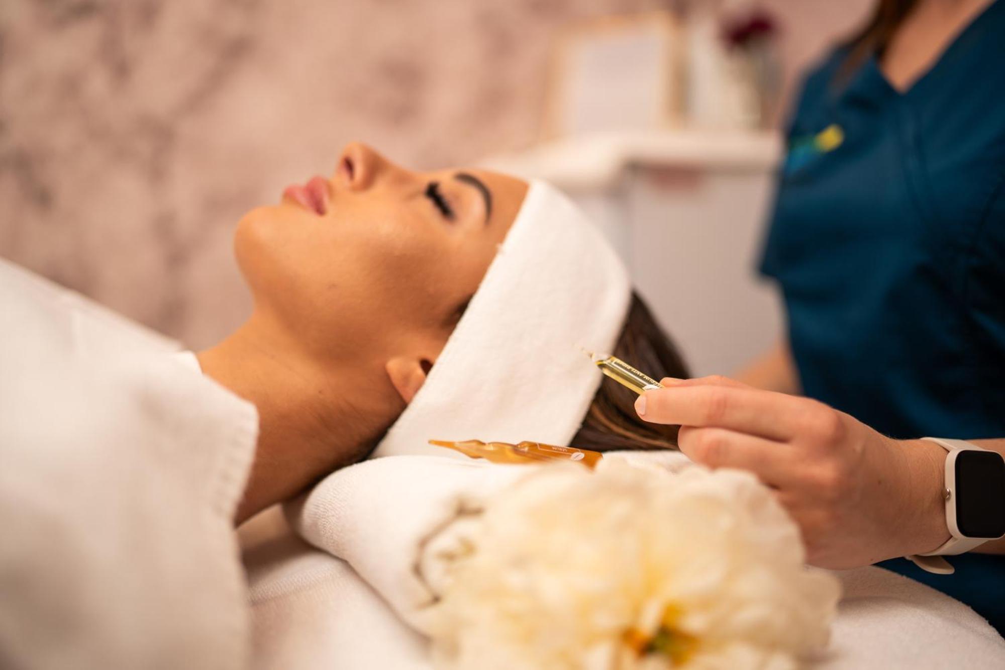 Hotel Premier Aqua - Adults Only Vrdnik Exterior photo A woman receiving a facial treatment